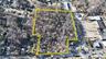 Aerial overview of property's location featuring property parcel outlined