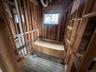 Miscellaneous room featuring wood-type flooring