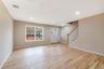 Entryway with stairs, light wood finished floors, and recessed lighting