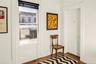 Living area featuring dark wood-style flooring