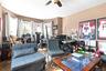 Office space featuring hardwood / wood-style flooring and a ceiling fan