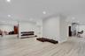 Basement Workout room with recessed lighting and crown molding