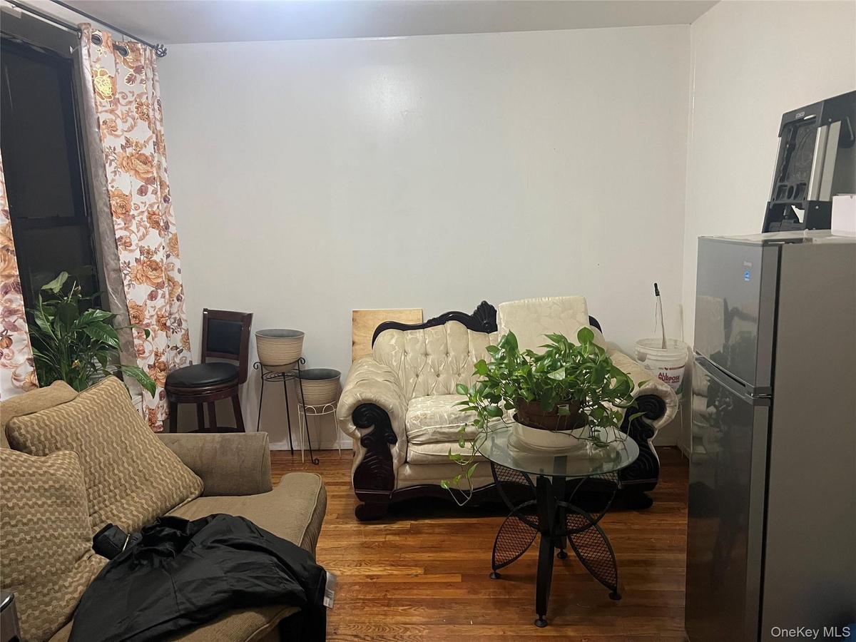 Sitting room featuring hardwood / wood-style flooring
