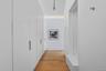 Corridor featuring light wood-type flooring