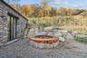 View of yard with a patio and a forest view