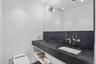 Bathroom with vanity, pet washing station, and recessed lighting