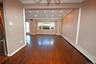 Unfurnished room featuring a baseboard heating unit, crown molding, dark wood finished floors, and recessed lighting
