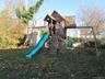 View of playground featuring a yard