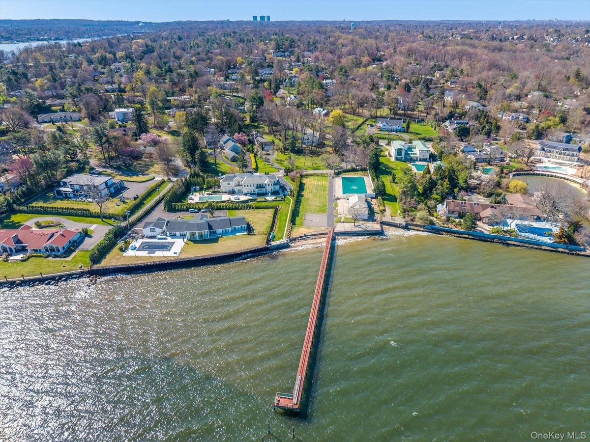 Aerial view of residential area with a large body of water