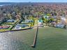 Aerial view of residential area with a large body of water