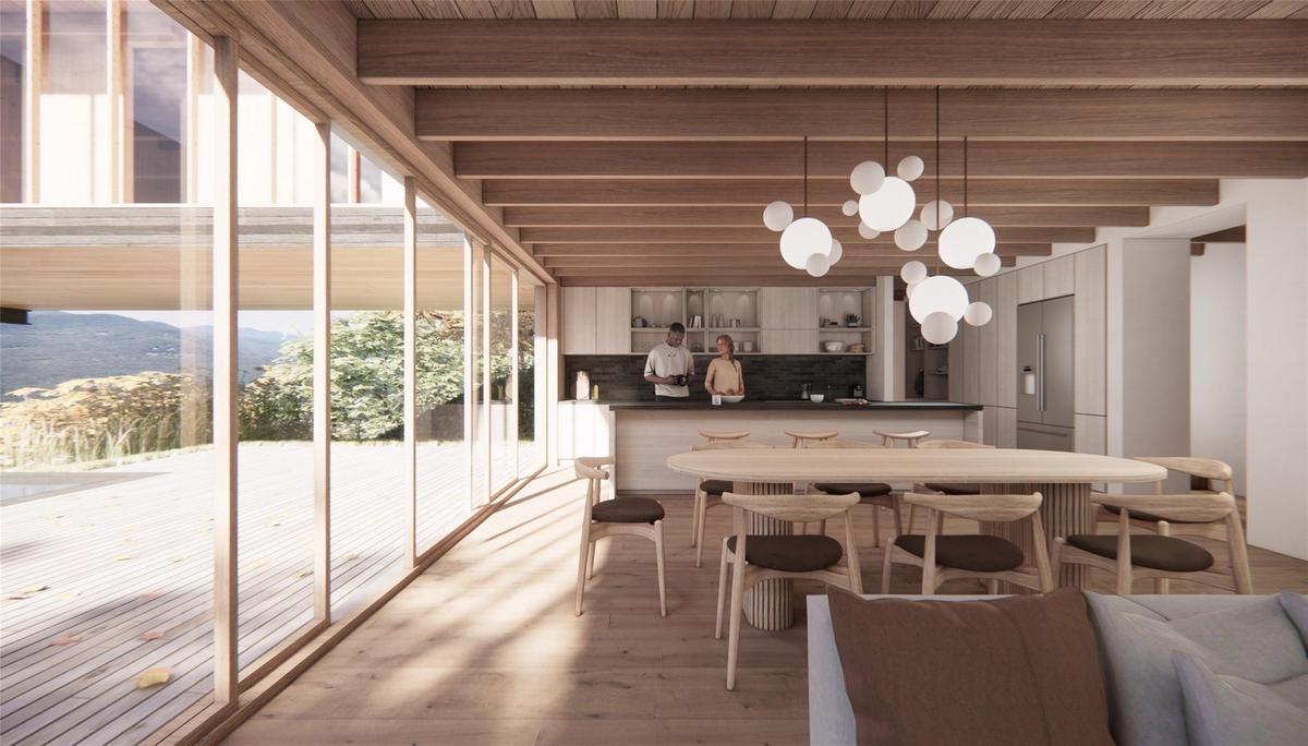 Sunroom / solarium featuring beamed ceiling, a mountain view, and a chandelier