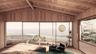Sunroom featuring a mountain view