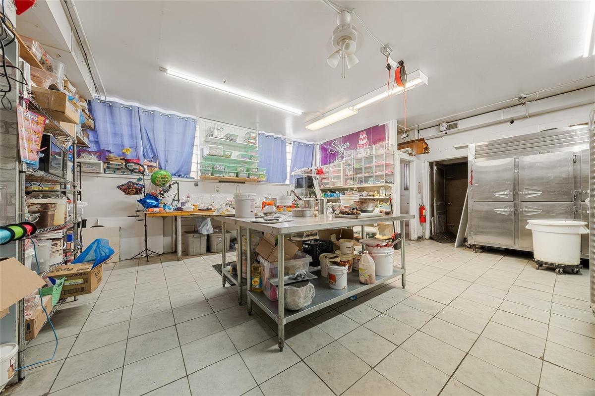 Kitchen featuring tile patterned flooring