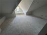 Additional living space featuring vaulted ceiling