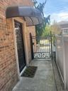 Gate featuring a balcony