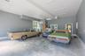 Garage featuring baseboards