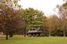 View of home's community featuring a yard and a porch