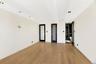 Unfurnished bedroom with light wood-style floors, recessed lighting, and beam ceiling