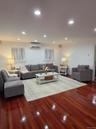 Living room featuring hardwood / wood-style floors and recessed lighting