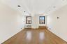 Unfurnished room with light wood-style floors, beam ceiling, and recessed lighting