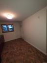 Empty room with baseboards