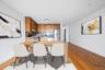 Dining area with baseboards and light wood-style floors