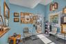 Sitting room featuring carpet floors and baseboards