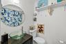 Full bathroom with vanity and a shower with curtain