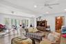 Living area featuring a ceiling fan, wood-type flooring, and recessed lighting