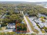 View of property location featuring property parcel outlined and a nearby body of water