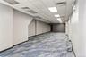 Finished basement with carpet and a drop ceiling