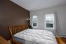 Bedroom with wood finished floors