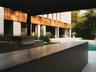 Outdoor kitchen w/ Green Egg, Gas Grill, & 2 refrigerators