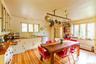 Dining area featuring light wood-style flooring and radiator