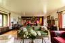 Living area featuring plenty of natural light, hardwood / wood-style flooring, and a barn door