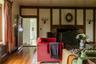 Living room featuring a fireplace and wood-type flooring