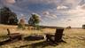 View of yard with a rural view