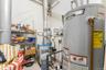 Utility room with gas water heater