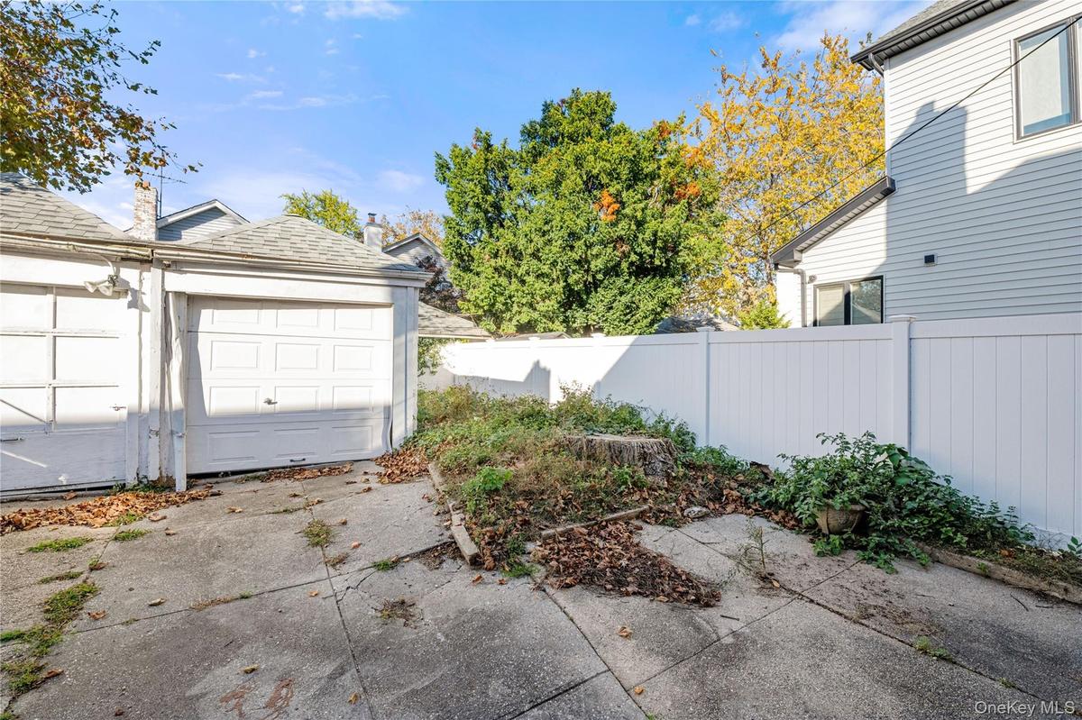 One car garage and yard