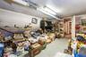 This basement family room currently used as storage room.