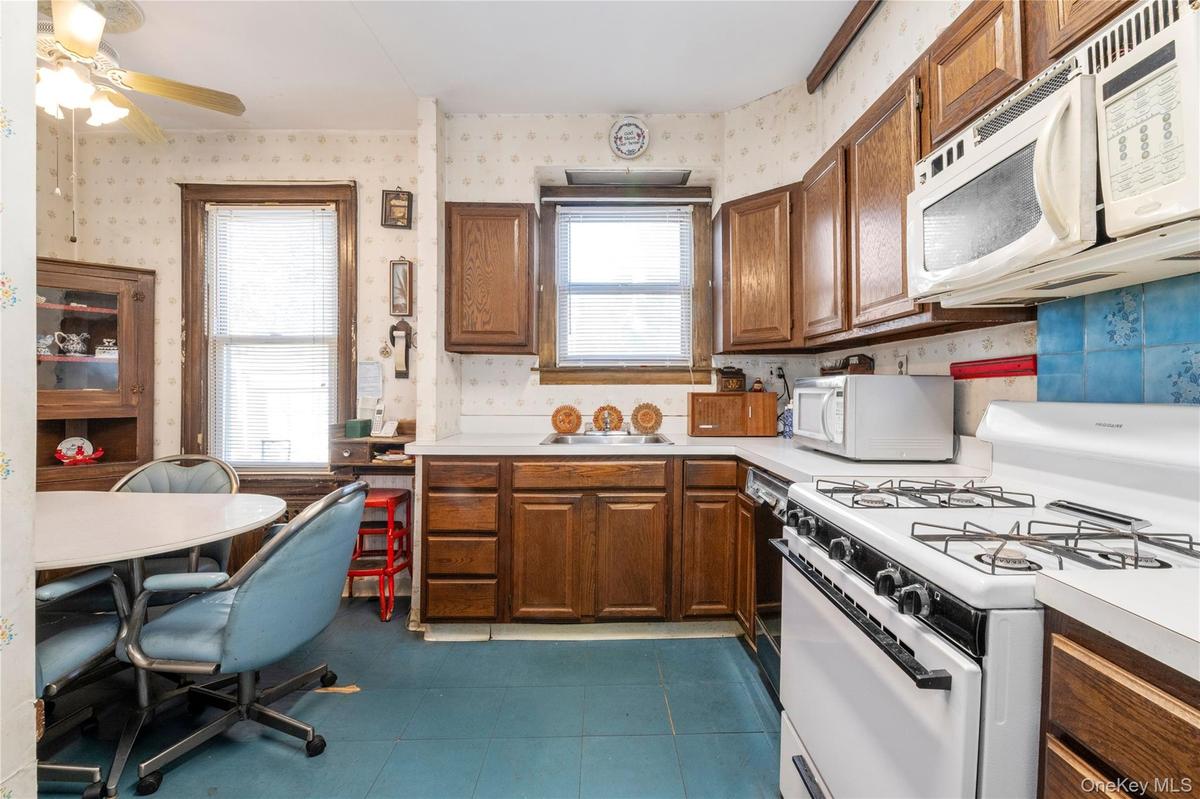 Kitchen with storage above cabinets and pantry