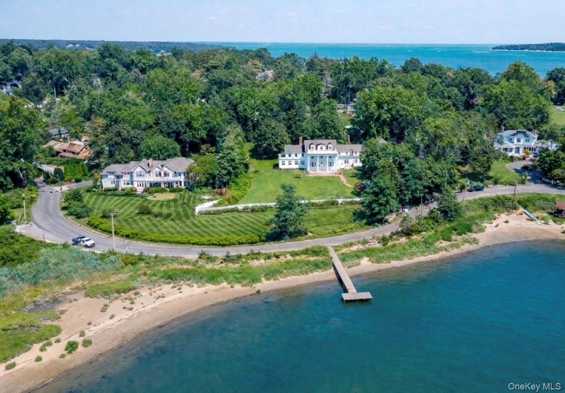 Aerial View - virtually staged floating dock in cove