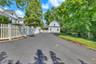 Large Driveway Leading to Garage