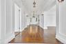 The Front to Back Center Hall Provides a Formal Transition to The Private Rooms that Flank it on Either Side