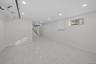 Basement featuring recessed lighting and baseboards