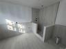 Full bath featuring walk in shower and tile patterned flooring
