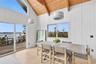 Dining area with sliders to deck, bbq and lounge & watch the spectacular sunsets