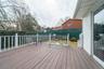 Deck with a fenced backyard