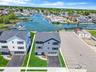 Aerial view of residential area with a large body of water