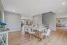 Dining room featuring light wood finished floors, stairway, and recessed lighting